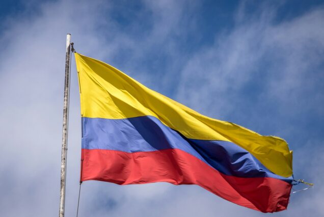 Waving Colombian Flag on a Blue Sky - Bogota, Colombia